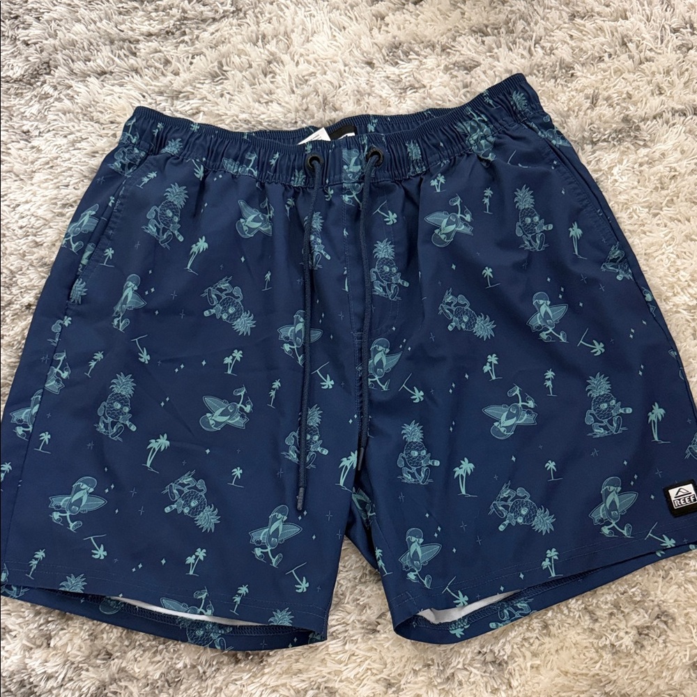 Reef Navy Blue Swim Trunks with Teal Island Print